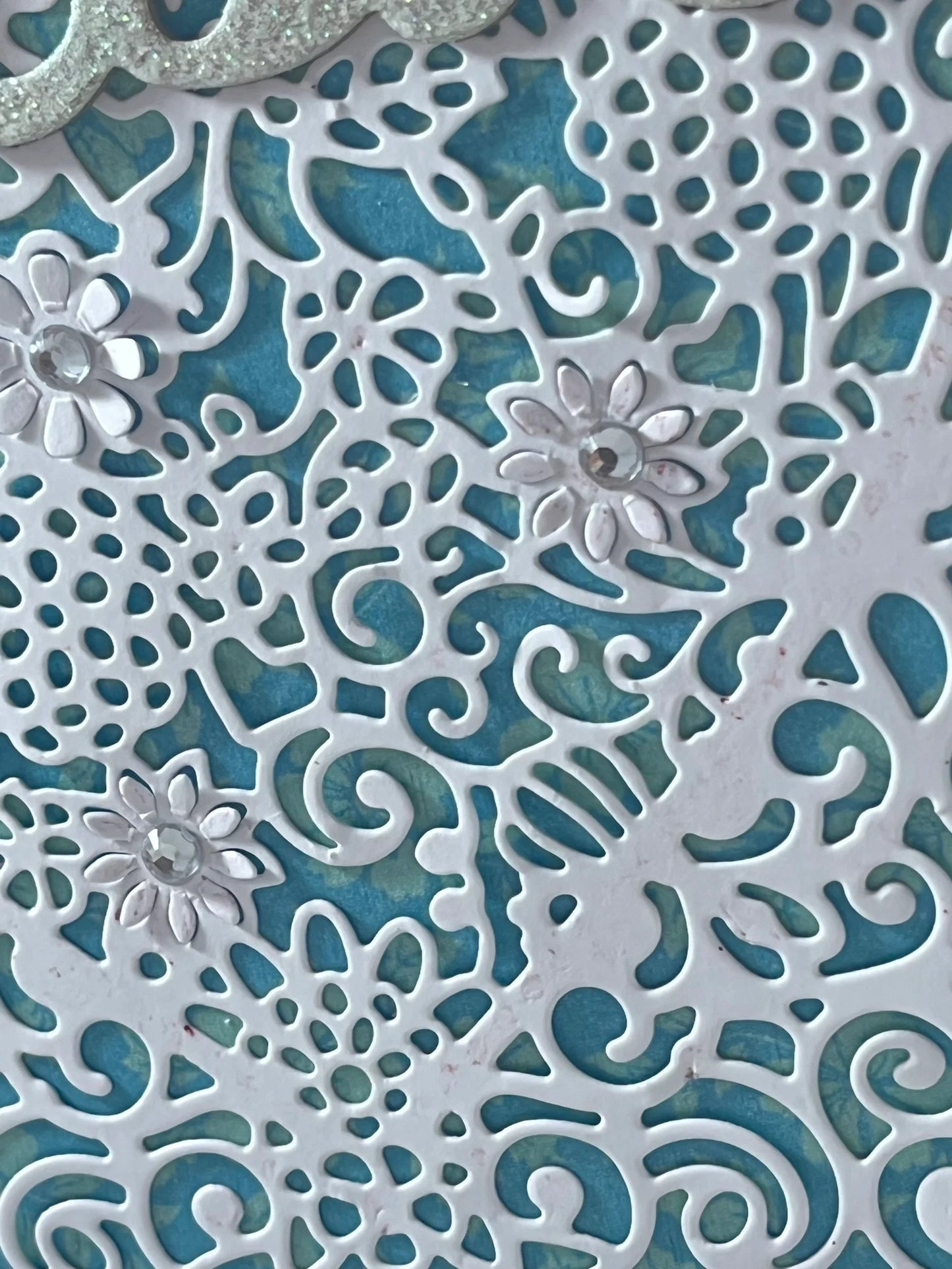 Filigree lace heart with glittered sentiment makes this handmade card stand out!